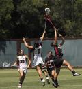 Lacrosse battle for the ball by Stanford-San Diego State