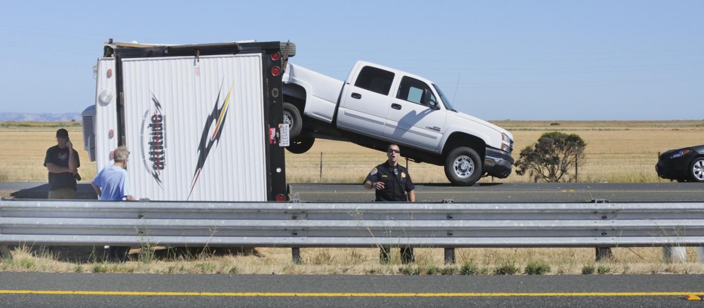 Jackknifed ToyHauler closes Highway 37 while Cop tells photographer to move on