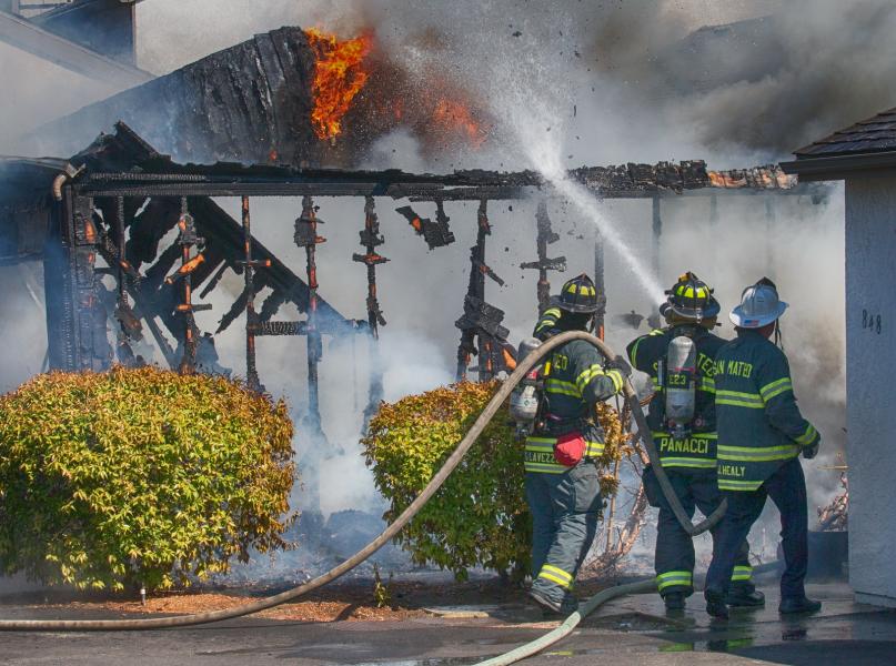 Two alarm house fire that started in the garage but quickly spread to the main house required 8 trucks and 40 fire fighters to knock down without any injuries - Foster City on Aug 18
