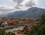 Here the oldest urban cable car system in the world built in 1934 rises more than 1,500 ft above the city of Grenoble, France.