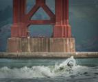 Surfing underneath the iconic Golden Gate Bridge is a picturesque experience for those able to catch a wave.