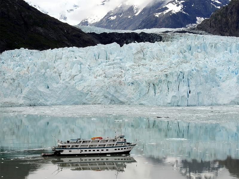 Tour boat is small near Margerie Glacier, Glacier Bay Natl Park, Alaska