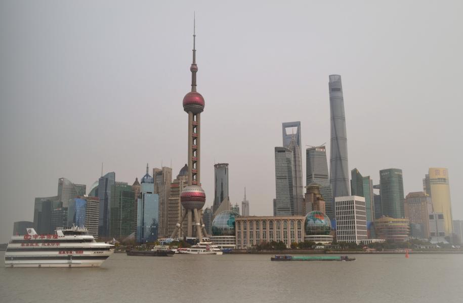Pudong is a modern district of Shanghai on the East bank of the Huangpu river, on this day, under a shroud of fine particulate haze.