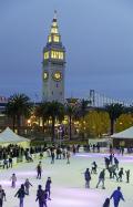 Ice Skating at Embarcadero Center with Ferry Building and San Francisco-Oakland Bay Bridge as backdrop