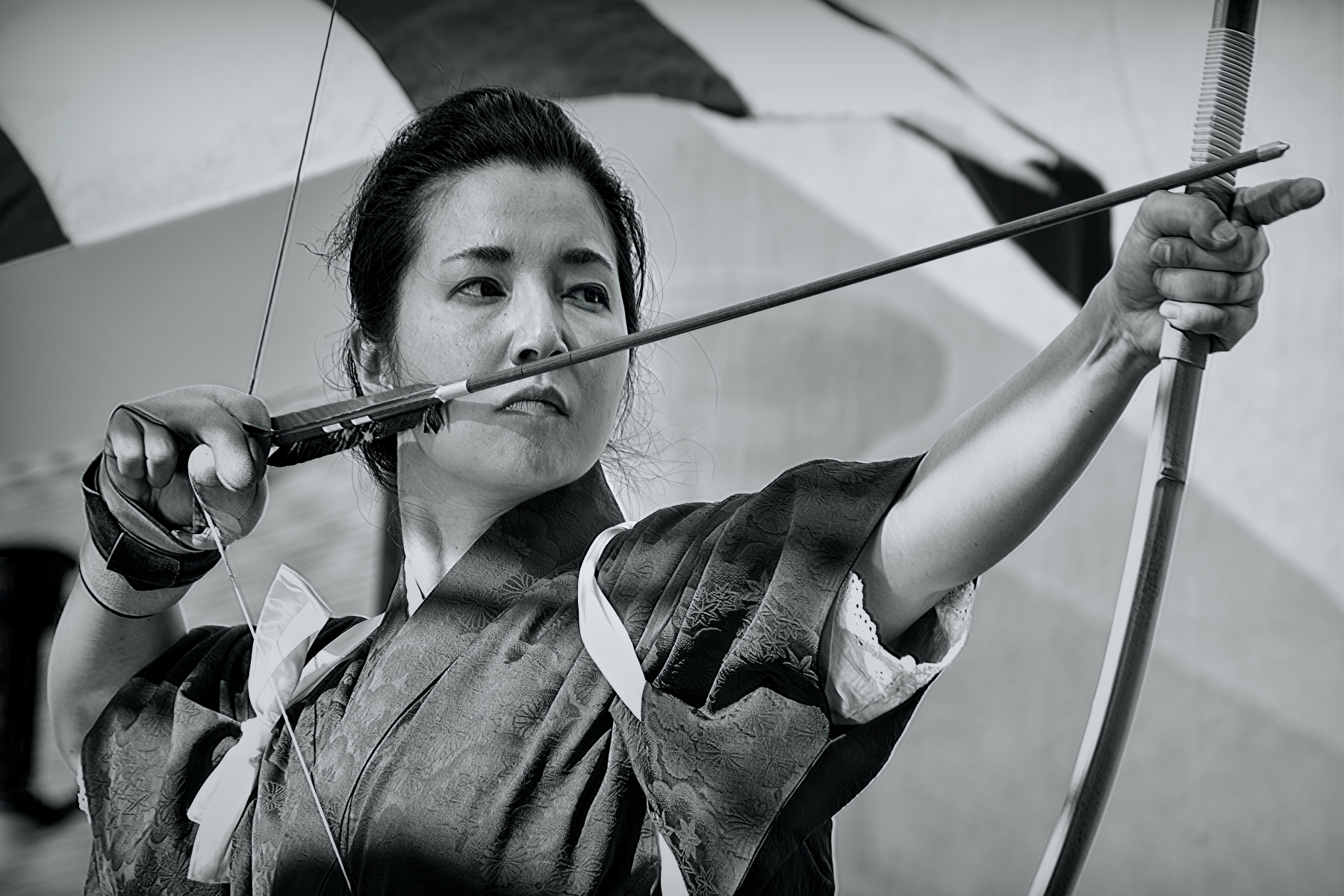 Kyudo Archeress Taking Aim.