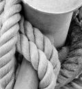 Ropes tied up around bollard