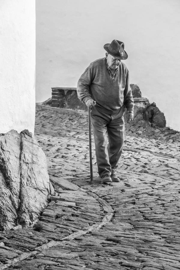Man with cane. Monsaraz, Portugal