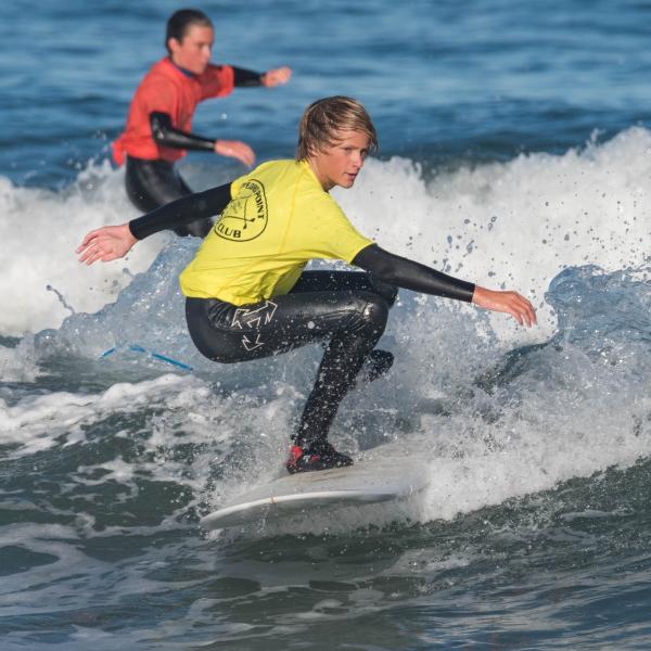 A young surfer in the annual Kahuna Kupuna competition at Linda Mar Beach in Pacifica