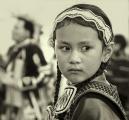 Native American girl casts a sidelong glance.