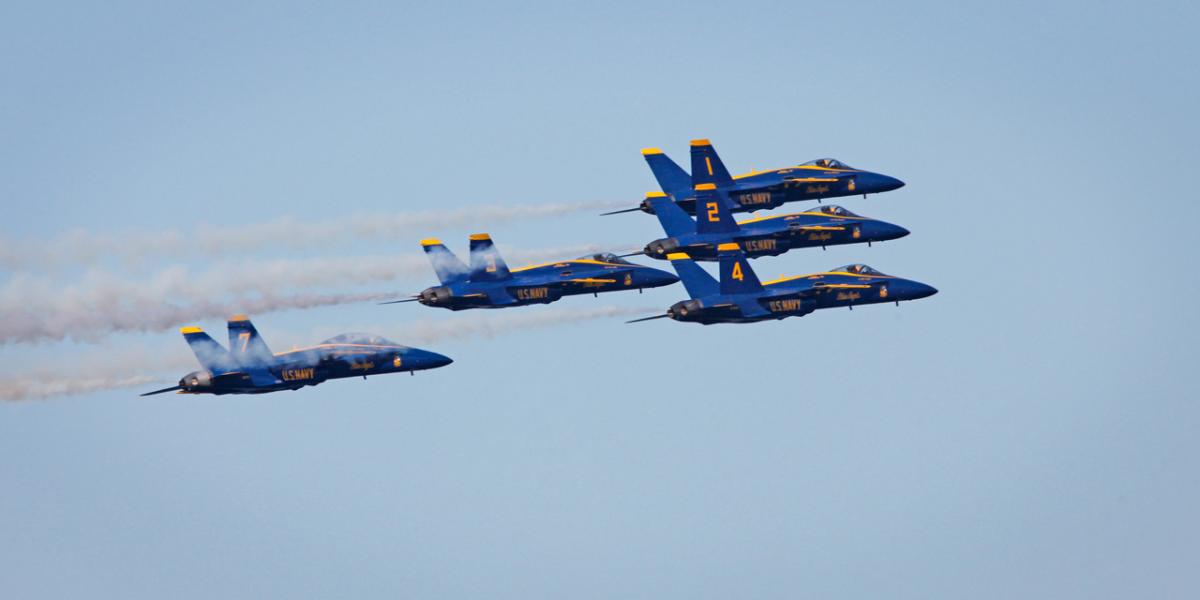 US Navy Blue Angels Fly in Tight Formation at Great Speed