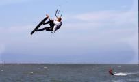 Kiteboarder soars high after Takeoff
