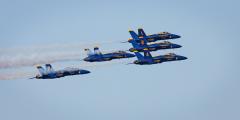 US Navy Blue Angels Fly in Tight Formation at Great Speed