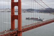 Cargo Ship Passes Under Golden Gate