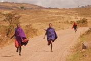Masai Herdsmen Run to Tourist Vehicle Hoping for Money